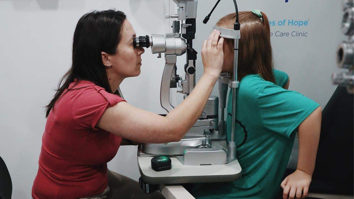A child gets a free eye exam at a VSP Vision Eyes for Hope mobile clinic.