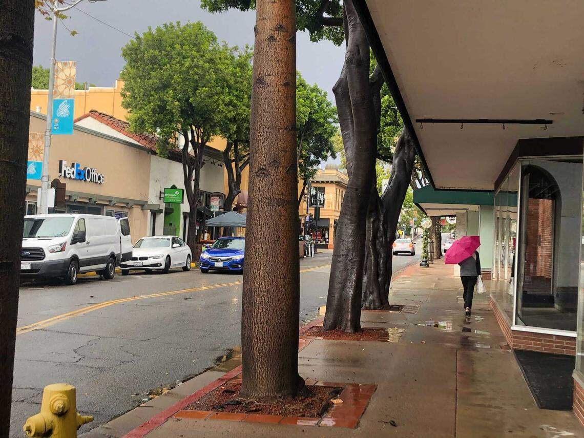 San Luis Obispo residents braved rainy, chilly weather during a walk downtown. The first storm of the season swept through the Central Coast, with most areas of San Luis Obispo County receiving at least an inch of precipitation.