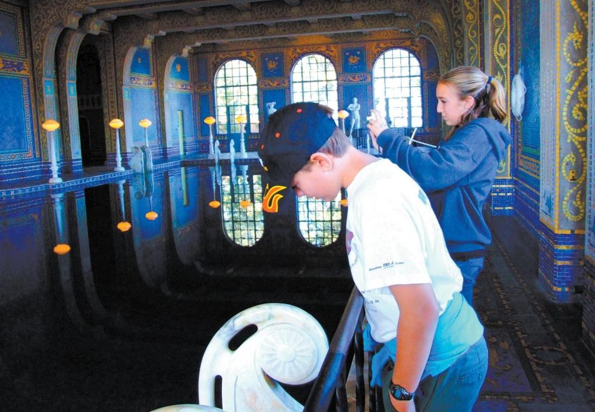 Brian, 9, and Ellen Long, 13, admire the design details at Hearst Castle’s Roman Pool in 2017.