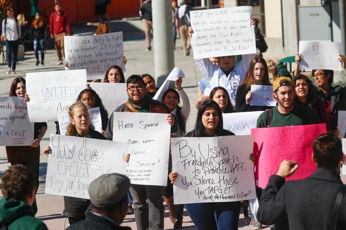 Cal Poly students march in protest at the University Union Plaza on Nov. 12. It was a reaction to appearance of derogatory comments drawn on a free speech wall targeting Muslim and transgender people.