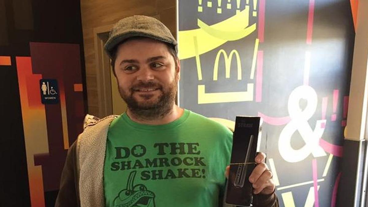 Brian Tanner, 33, of San Luis Obispo displays the specialty straw he received at a McDonald’s in Arroyo Grande on Friday, February 24, 2017. The straw was part of a promotional tactic by the store to advertise for its new Chocolate Shamrock Shake.