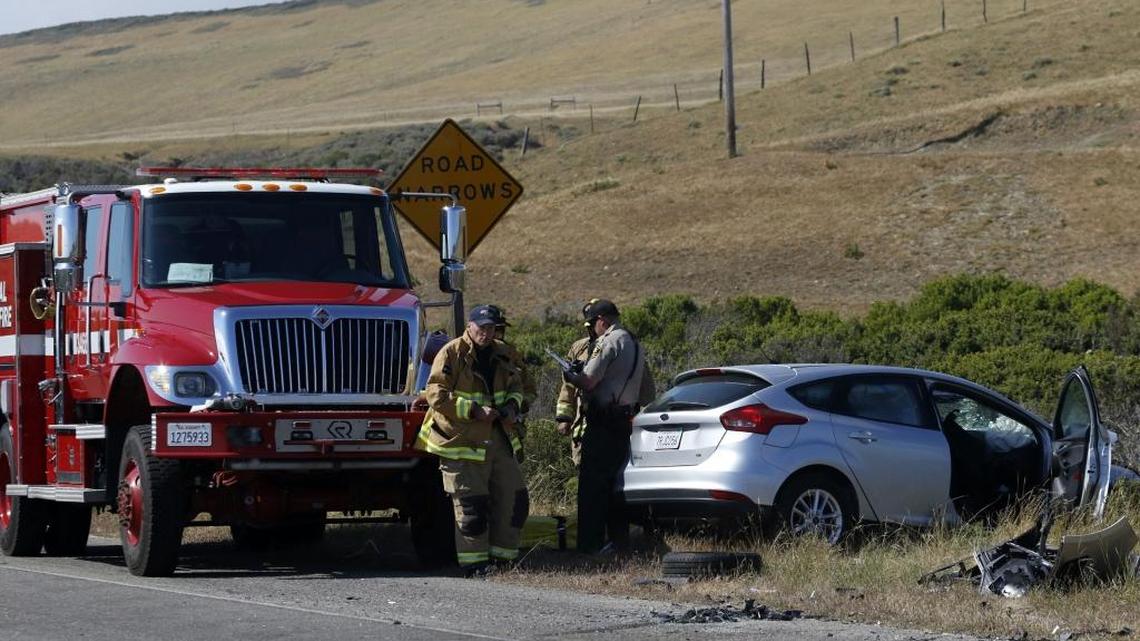 CHP and Cal Fire responders investigate the scene of a two-car head-on collision Wednesday afternoon on Highway 1 just north of Piedras Blancas. One person was killed and three injured in the crash.
