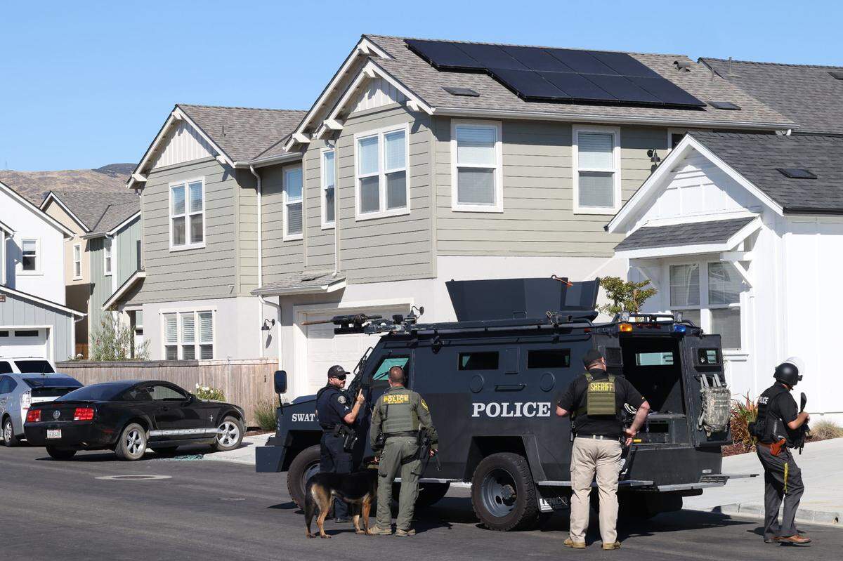 Police respond to a home in the San Luis Ranch neighborhood of San Luis Obispo on Thursday evening, Aug. 17, 2023, where they ordered the occupants to come out after arresting a shooting suspect nearby.