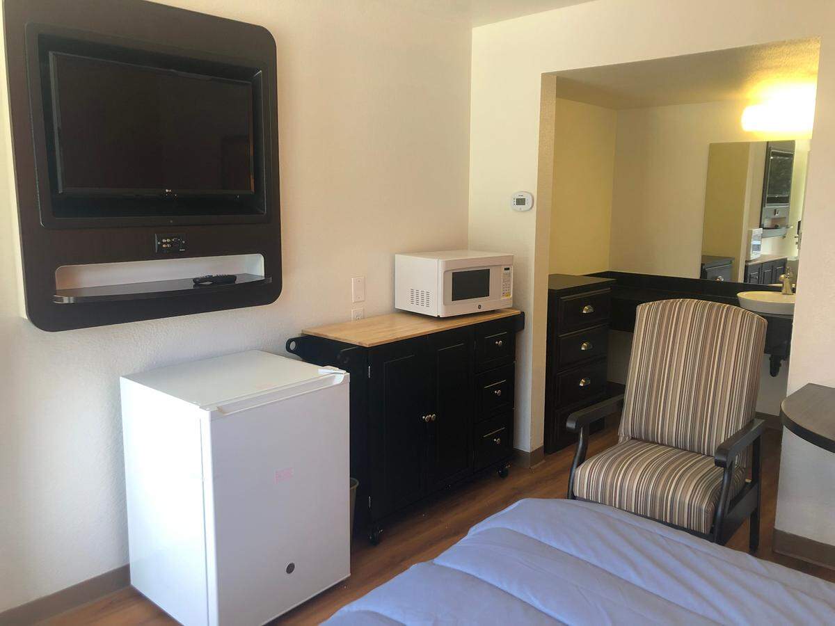 Hotel rooms at the former Motel 6 in Paso Robles have been converted to subsidized studio apartments rented by the Housing Authority of San Luis Obispo (HASLO). Most of the original motel furniture remains, although HASLO added some additional touches, including refrigerators and microwaves.
