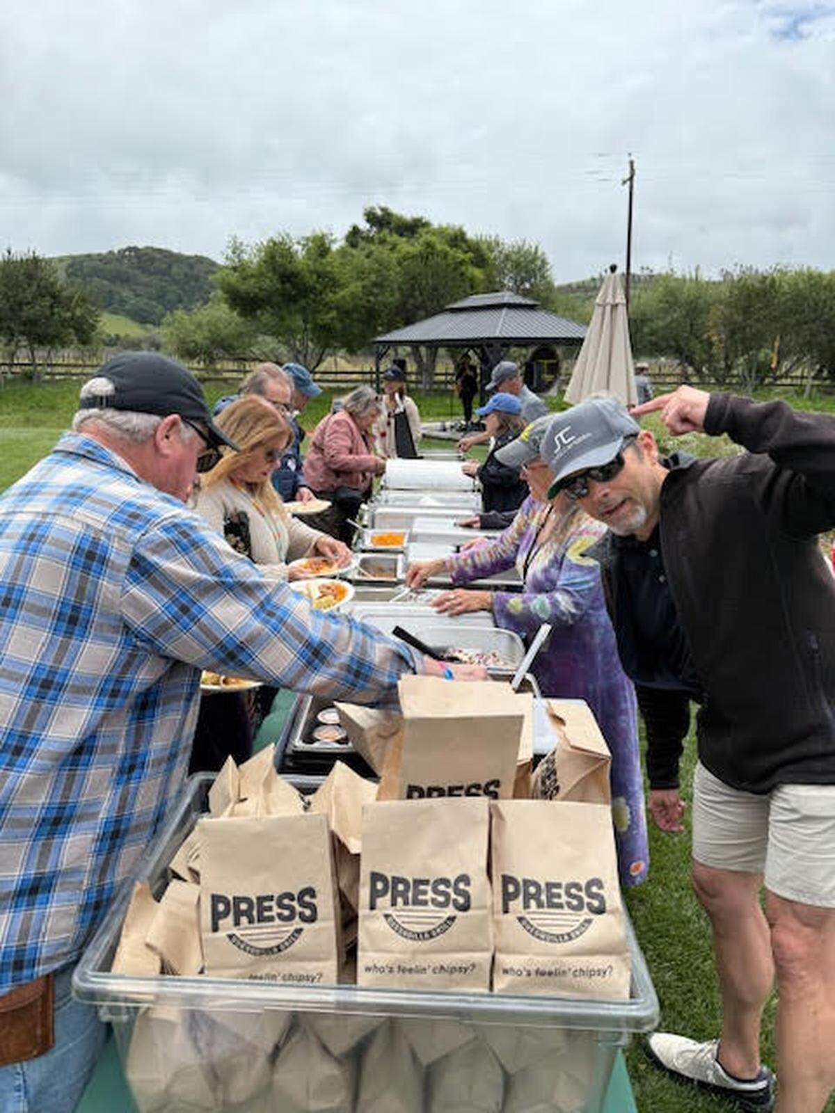 Supporter and volunteer David Glennon shows off his Skate Cambria logo cap during a well-attended fundraiser Sunday, April 27, 2025. The event raised $12,500 toward a new skate park for the North Coast village.