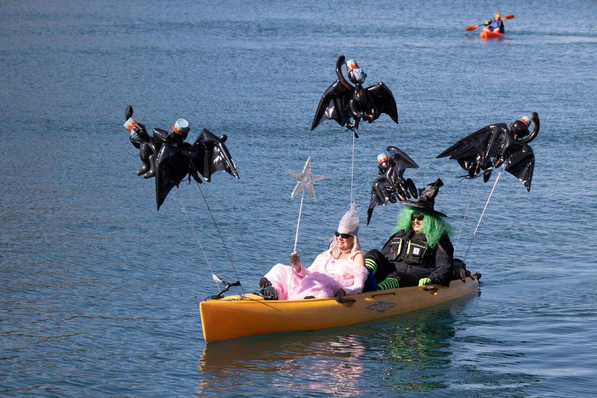 Hundreds of people turned out for the 10th annual Witches and Warlocks Paddle in Morro Bay on Oct. 29, 2023.