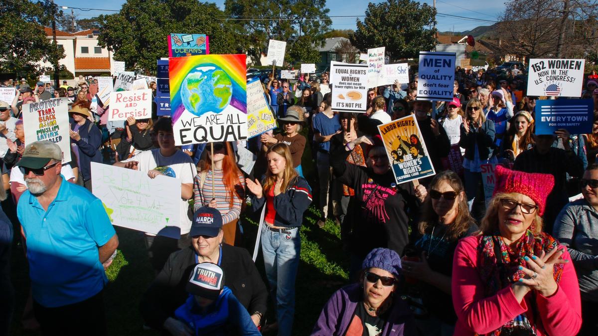 Women’s March participants gather at Mitchell Park in San Luis Obispo in January 2019.