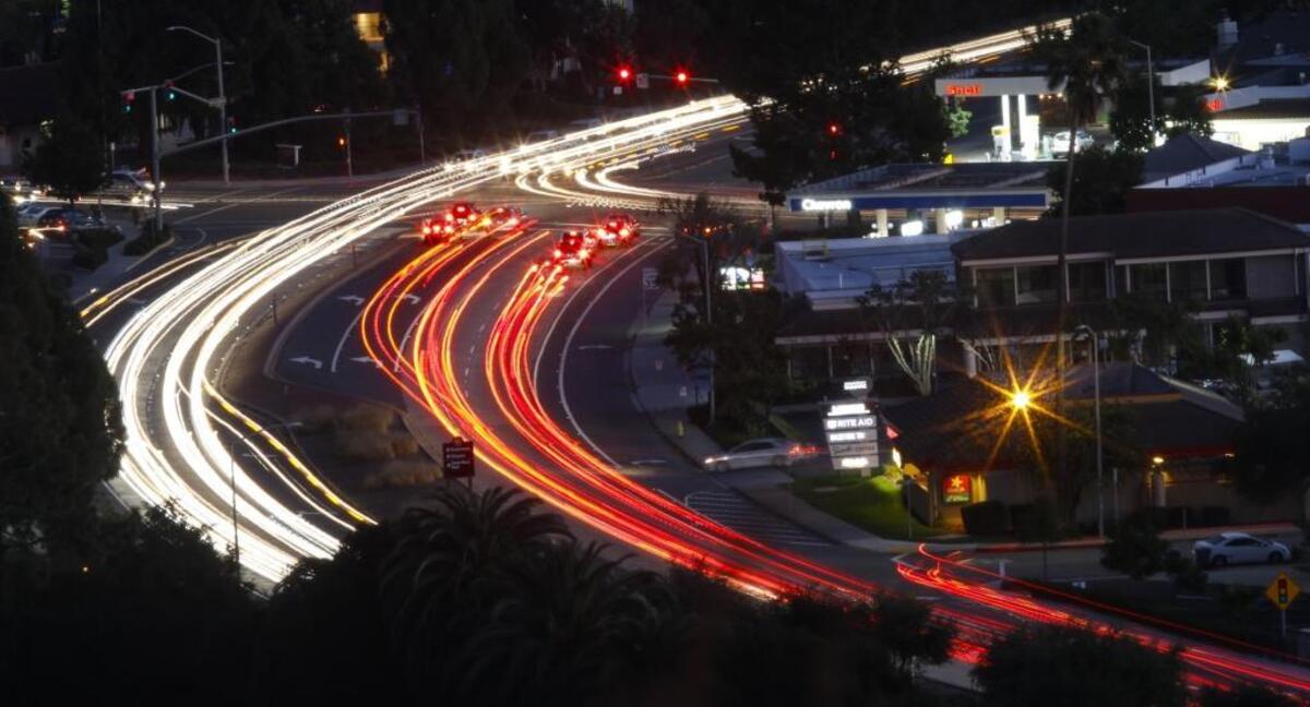 Cars pass through the intersection of Santa Rosa Street and Foothill Boulevard during a 30-second time exposure. It’s one of the busiest in the city.