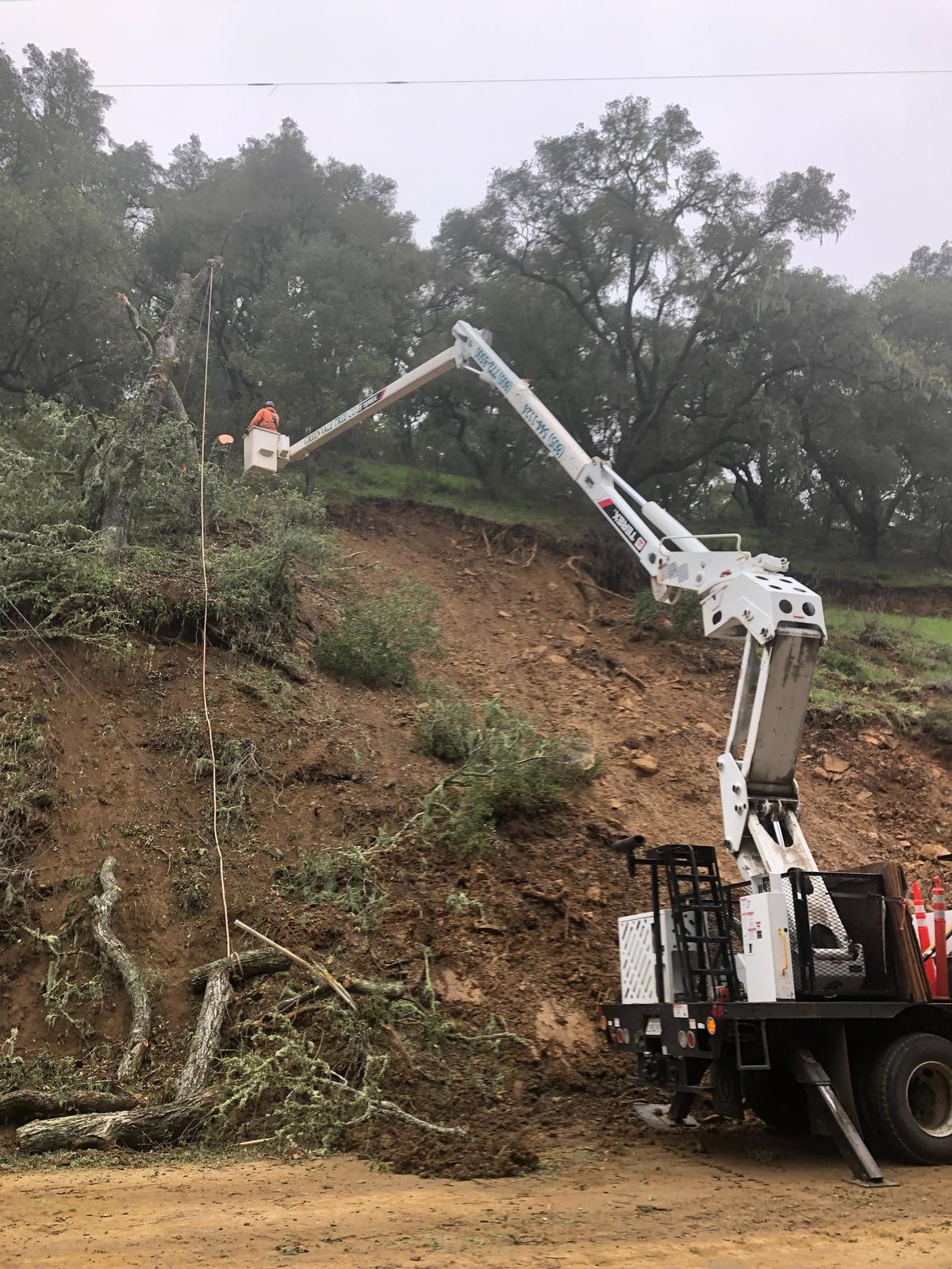 Crews work to repair slides on Highway 41 west of Atascadero on March 17, 2023.