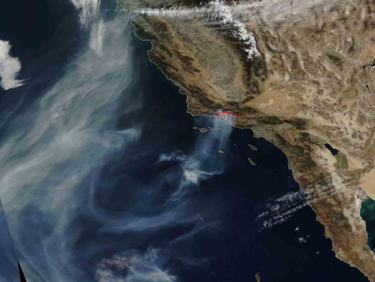 NASA’s Aqua satellite captured this image of the Thomas Fire on Wednesday, December 13, 2017. Actively burning areas detected by MODIS’s thermal bands are outlined in red. Such hot spots are diagnostic for fire when they are accompanied by smoke. These hot spots are accompanied by copious amounts of smoke coming off the fire and trending northward as shown in this NASA image, courtesy of the NASA Worldview application operated by the NASA/Goddard Space Flight Center Earth Science Data and Information System project.