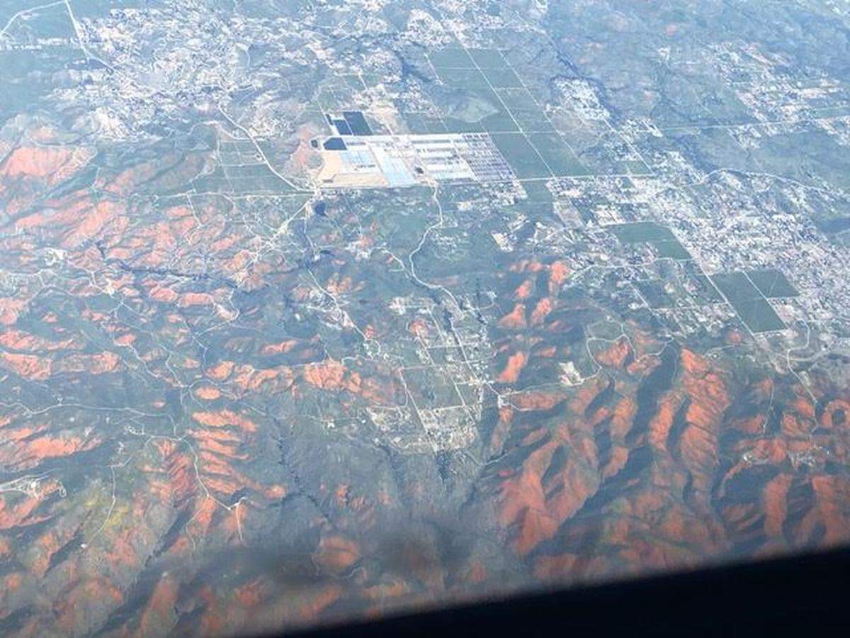 The wild poppy super bloom in Walker Canyon near Lake Elsinore in Riverside County, as seen from a plane flying 30,000 feet above the area on March 15, 2019.