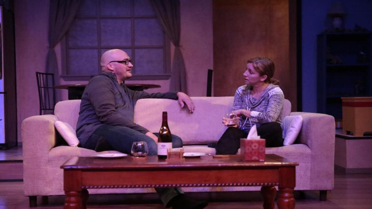 Becca (Christina Diaz) and Howie (Michael Phillip Thomas) discuss Becca’s recent encounter with her sister in “Rabbit Hole,” playing Friday through Oct. 22 at San Luis Obispo Repertory Theatre.