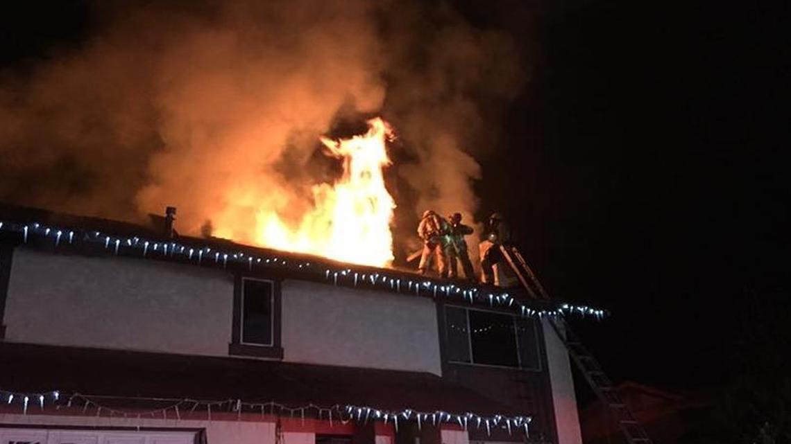 Santa Maria firefighters battle a house fire on the 1300 block of Smoke Tree Lane on Sunday, Dec. 25, 2016.