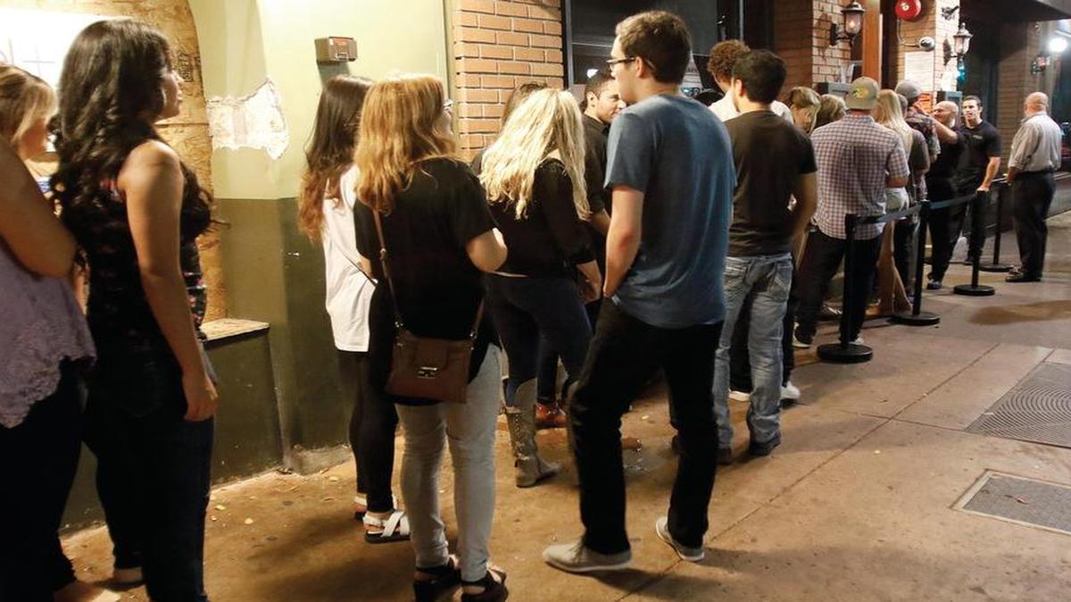 Lines into bars on Higuera Street in downtown San Luis Obispo.