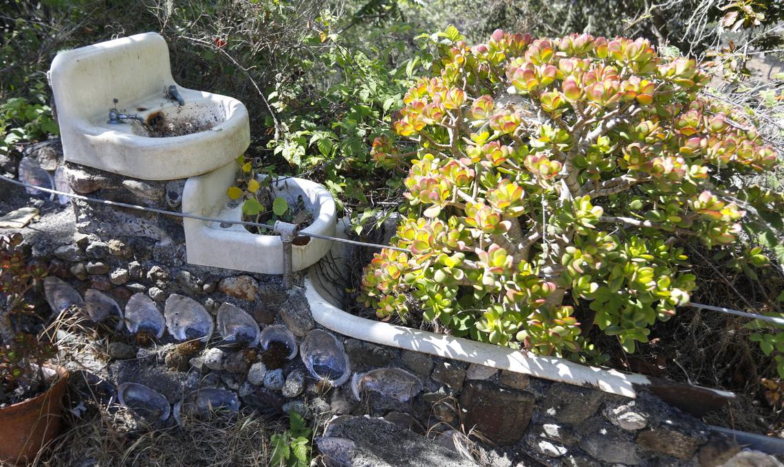 A cascading fountian made of sinks and a bathtub at Nitwit Ridge in Cambria, the eclectic found art home made by Art Beal, Der Tinkerpaw or Capt. Nitwit. David Middlecamp 6-22-2018