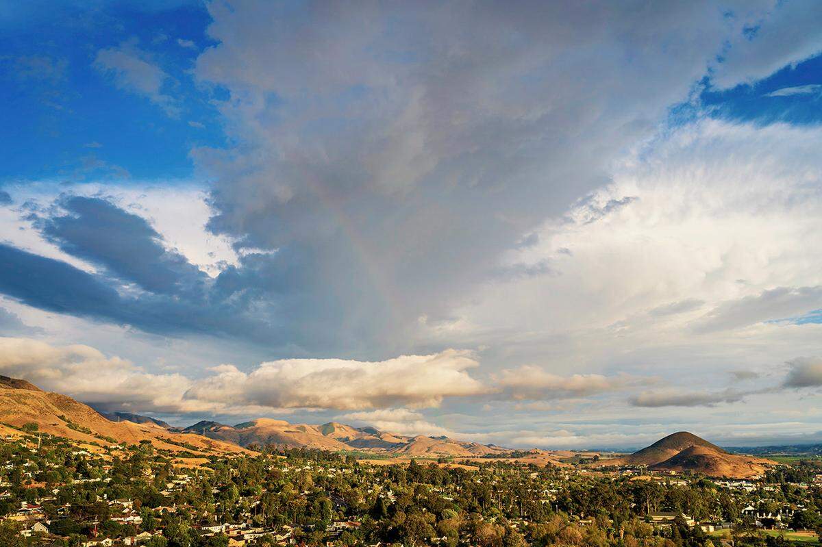 A rainbow and storm clouds fill the skies over San Luis Obispo in 2024.