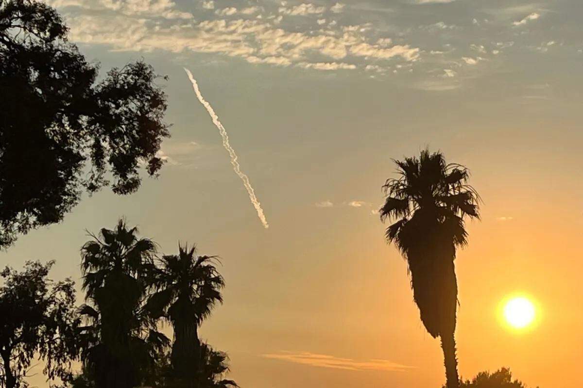 A SpaceX Falcon 9 rocket carrying Starlink satellites launches Thursday night, July 11, 2024, from Vandenberg Space Force Base, as seen from Santa Barbara’s Chase Palm Park.