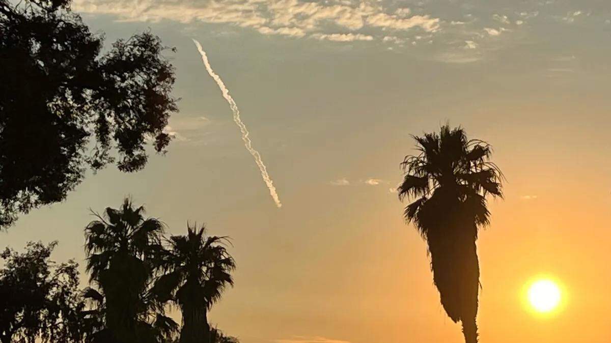 A SpaceX Falcon 9 rocket carrying Starlink satellites launches Thursday night, July 11, 2024, from Vandenberg Space Force Base, as seen from Santa Barbara’s Chase Palm Park.  