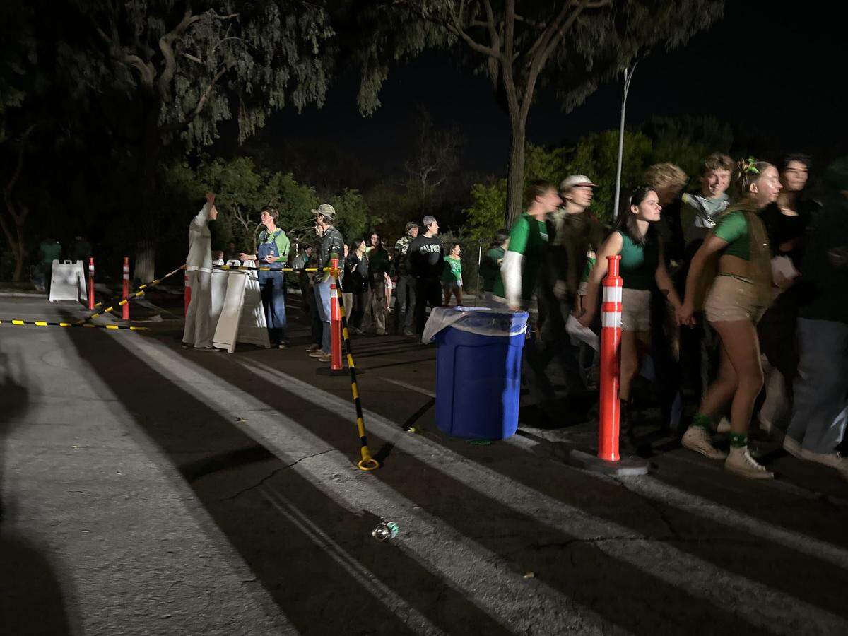 People swarm the line to get into an on-campus concert on March 15, 2025, minutes before standby was set to be allowed into the Cal Poly venue.
