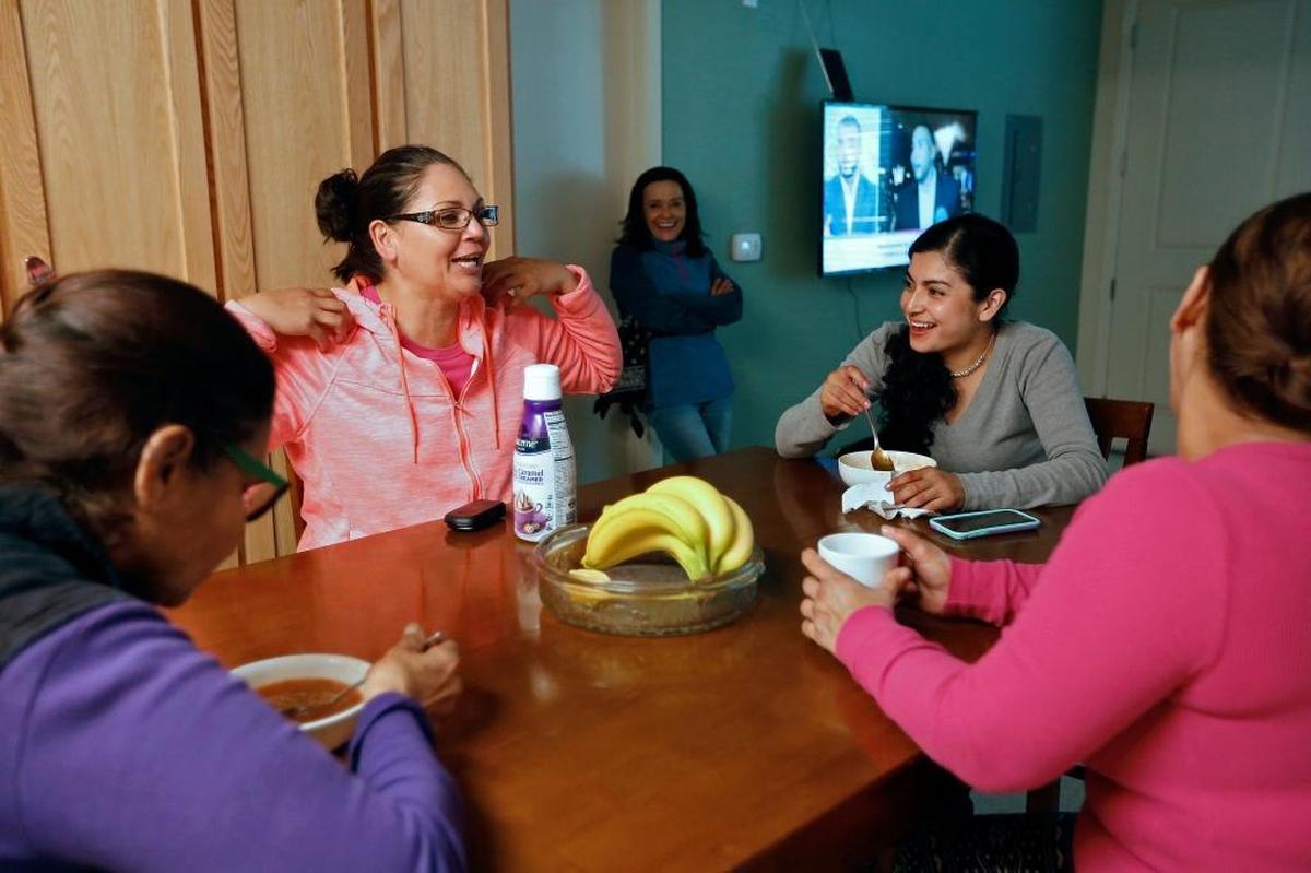Dora Jan, left, Margarita Padilla, Maricela Williams, Irma Ramos and Lucia Jaques, all of Yuma, Arizona, at the Spreckels Crossing housing complex built by Tanimura & Antle Produce in Spreckels in the Salinas Valley. The two-bedroom suites were designed for foreign guest workers, but the company found that its own domestic workforce was eager to move in.