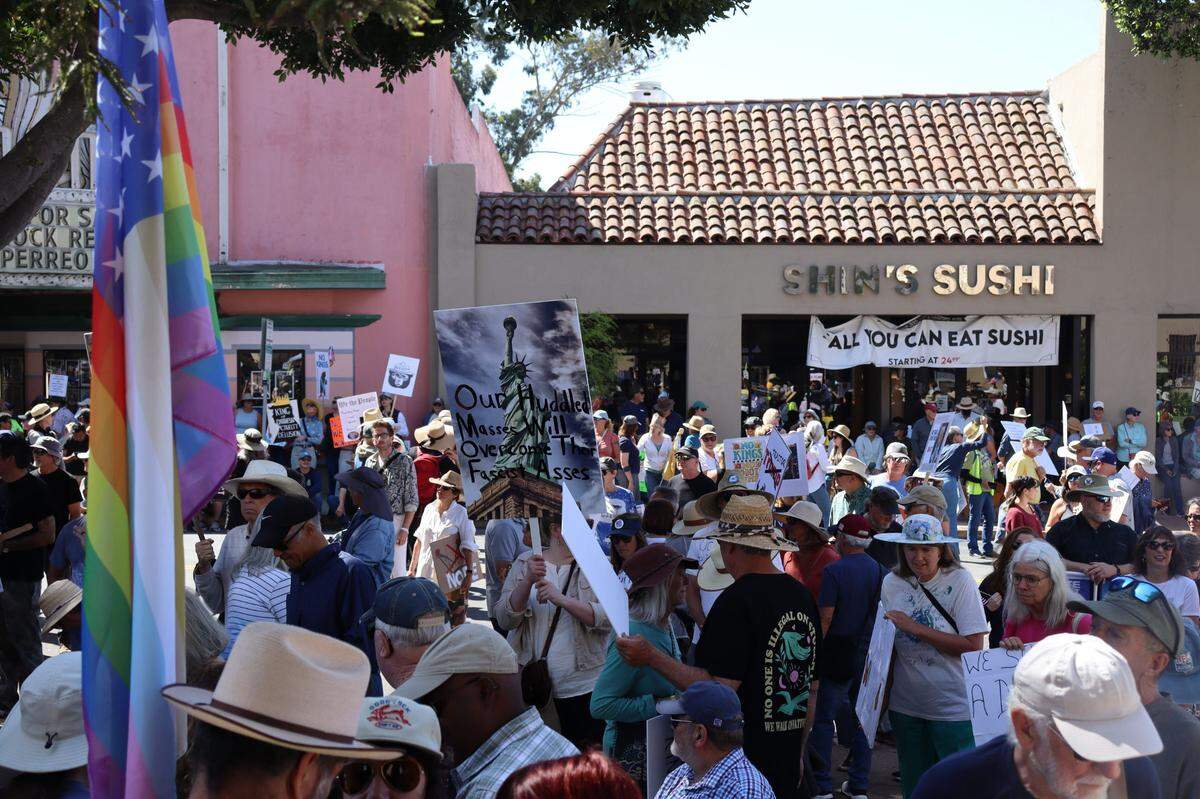 Protestors gathered in front of the courthouse in San Luis Obispo, for No Kings Day to protest executive overreach by the Trump administration on the president’s birthday.