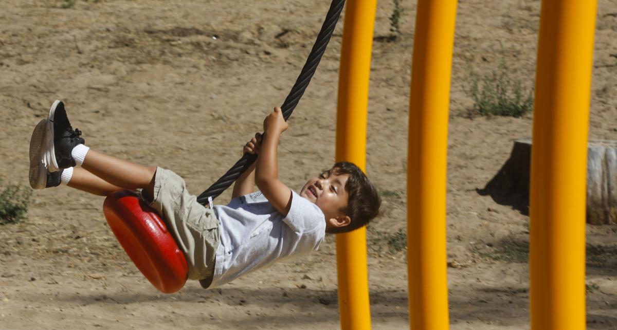 Roland Meza, 4, enjoys the sky run zip tract at Nipomo Community Park, which celebrated the completion of playground improvements in June 2018.