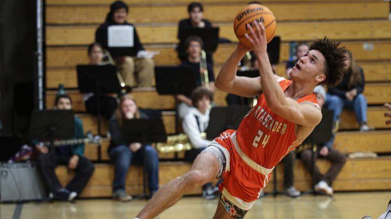 Atascadero beats SLO 60-57. See the photos