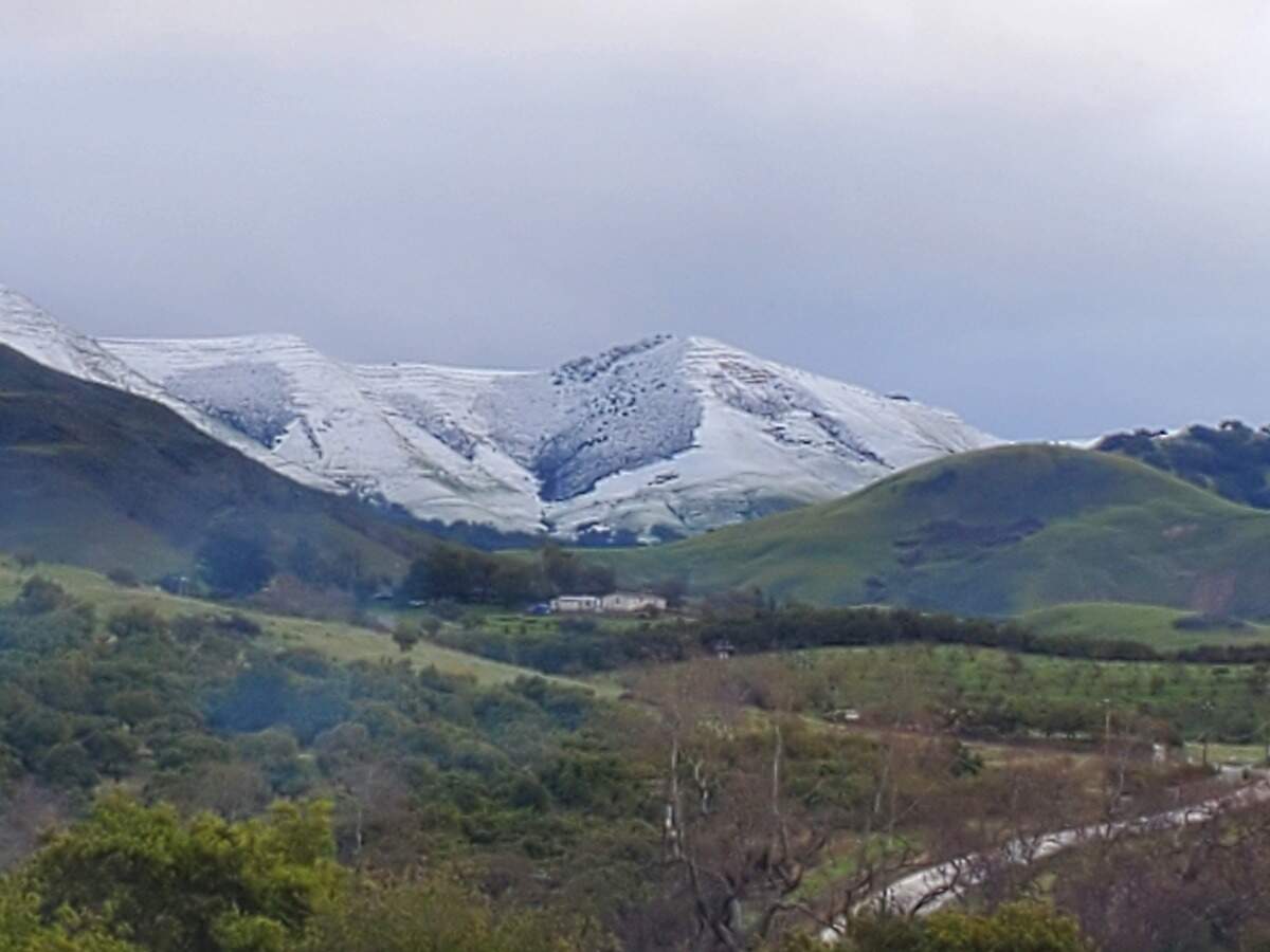 A view of snow dusting the mountains surrounding Edna Valley on Feb. 25, 2023.