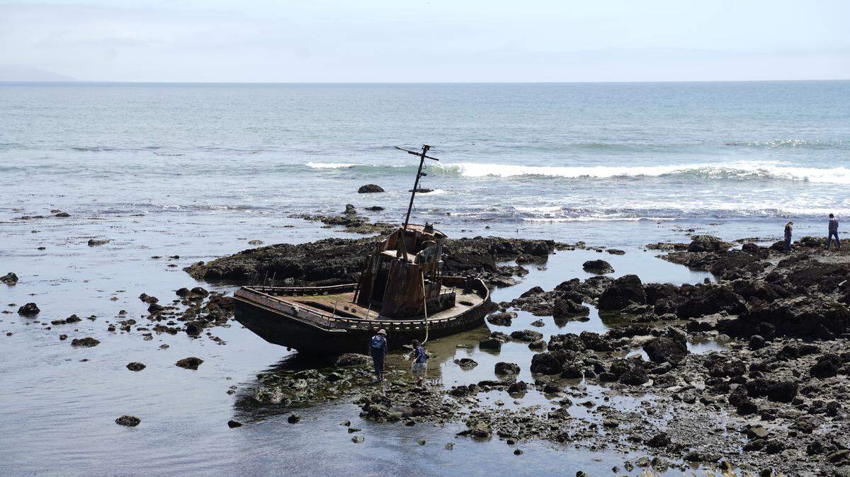 Tourists hike to an abandoned shipwreck in Estero Bluffs State Park on Sunday, April 30, 2023.