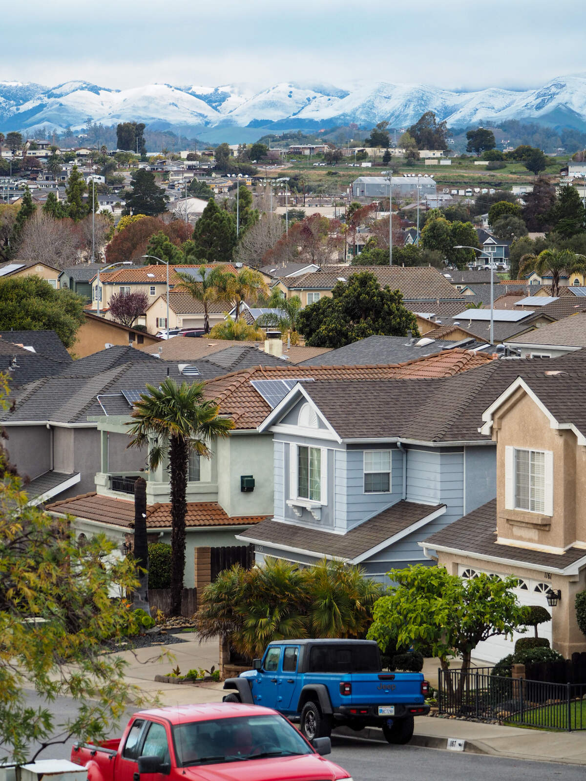 Snow dusts the hills in south San Luis Obispo County in a view from Grover Beach on Saturday, Feb. 25, 2023.
