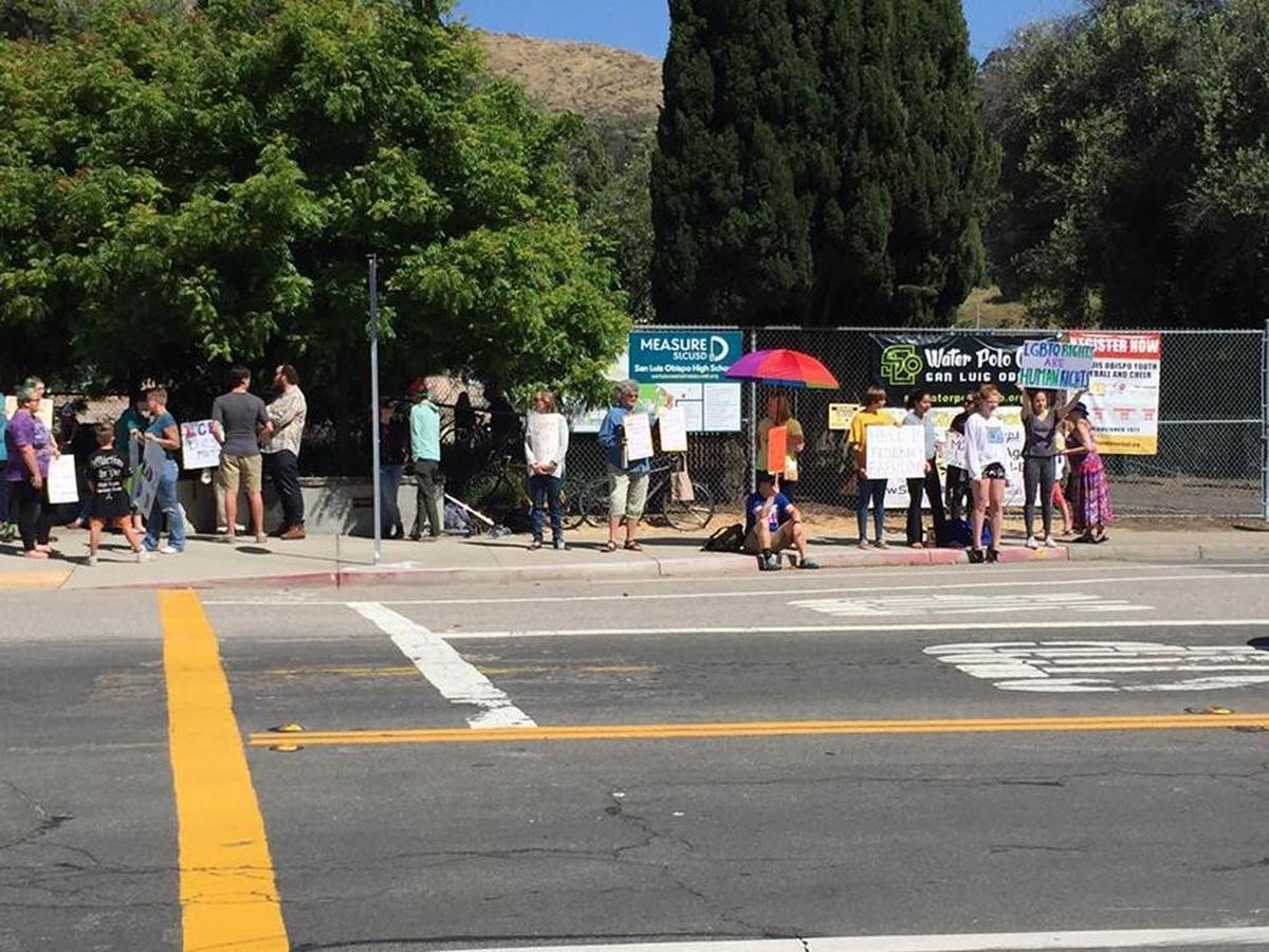 An estimated 60 people showed up to protest teacher Michael Stack in front of San Luis Obispo High School on Thursday, May 11, 2017. Rally organizer Michelle Call said she was aware of at least two students who were afraid to attend school while Stack, who wrote a letter saying gay people “deserve to die,” remained employed there.