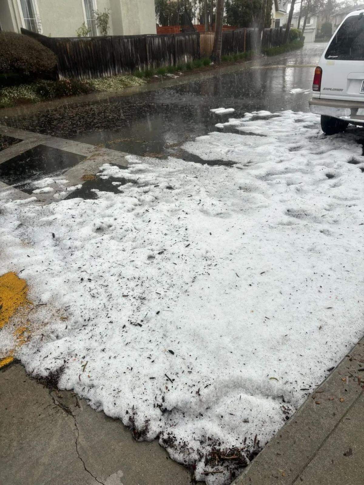 Drifts of hail collect in the Storke Ranch development in Goleta on Sunday morning, Jan. 26, 2025.