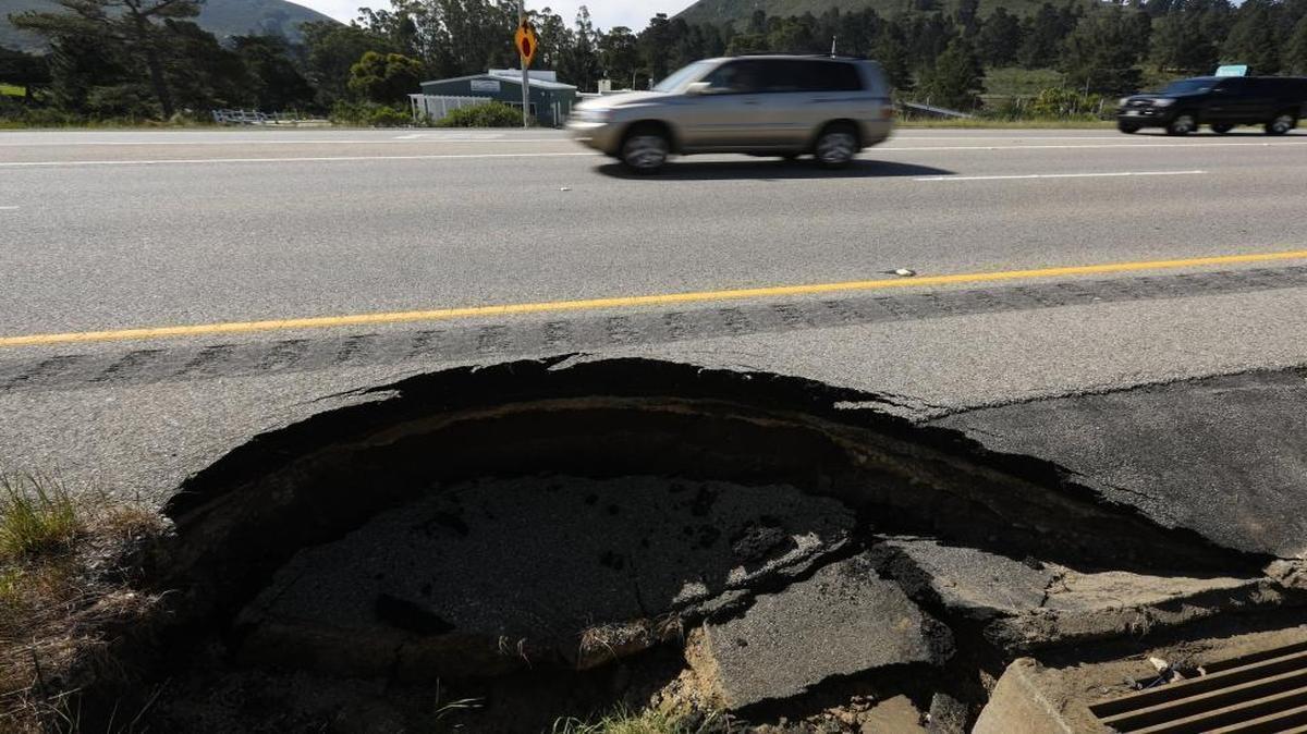 A sinkhole appeared Wednesday in the center divider of on Highway 1 near South Bay Boulevard. It was located near a drain.