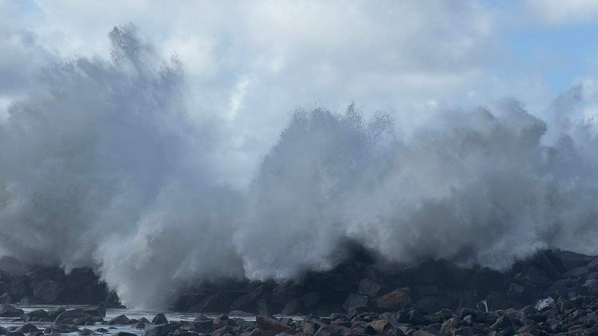 Powerful waves crash over the breakwater in Morro Bay on Saturday, Dec. 30, 2023.