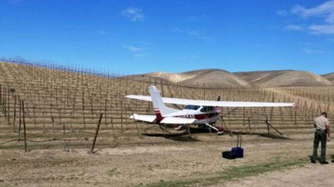 A plane with two passengers on board made an emergency landing in a San Miguel vineyard on Wednesday.