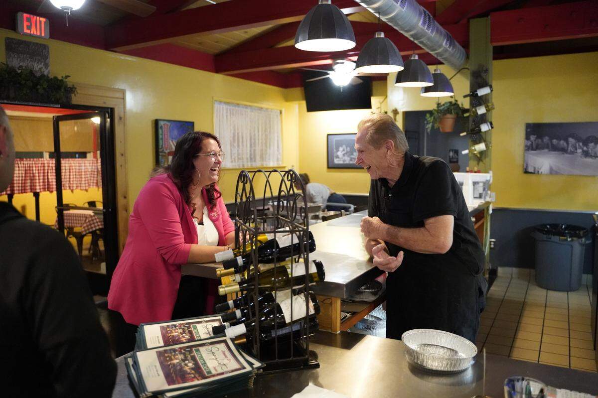 Kassi Dee took a slight early lead in the race for Grover Beach mayor on Nov. 5, 2024. Dee, pictured above with Jimmy Delmore, celebrated early returns at an Election Night party at Jimmy D’s Spaghetti Joint.
