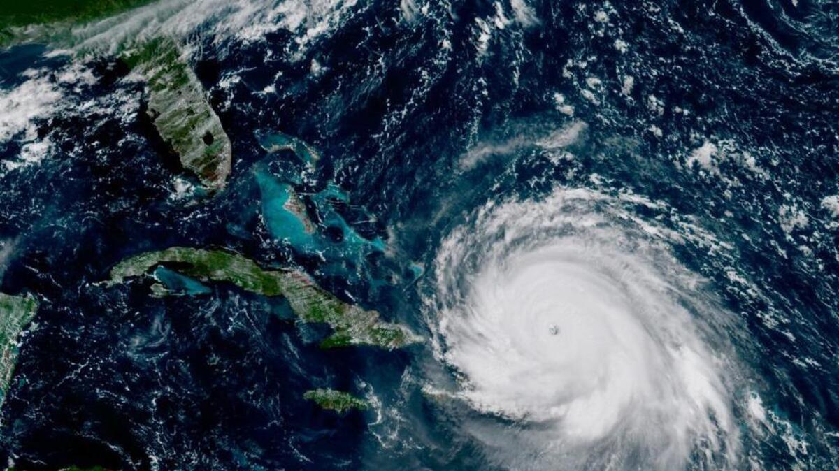 This geocolor GOES-16 satellite image taken Thursday shows the eye Hurricane Irma just north of the island of Hispaniola. The fearsome Category 5 storm cut a path of devastation across the northern Caribbean, leaving at least 10 dead and thousands homeless after destroying buildings and uprooting trees on a track Thursday that could lead to a catastrophic strike on Florida.