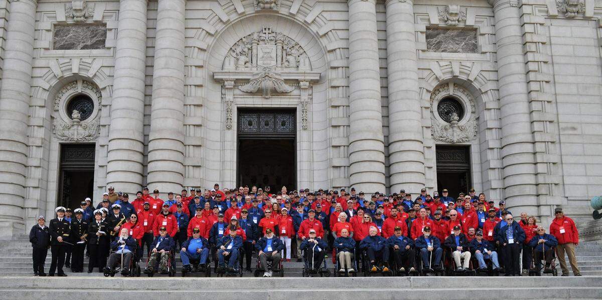Honor Flight participants from the Central Coast gather for a group photo in Washington, D.C., on Tuesday, April 25, 2023.