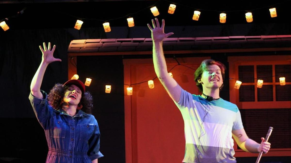 Sierra Wells and Mike Fiore appear in a scene from “The Karaoke Kid,” playing at the Great American Melodrama and Vaudeville in Oceano.