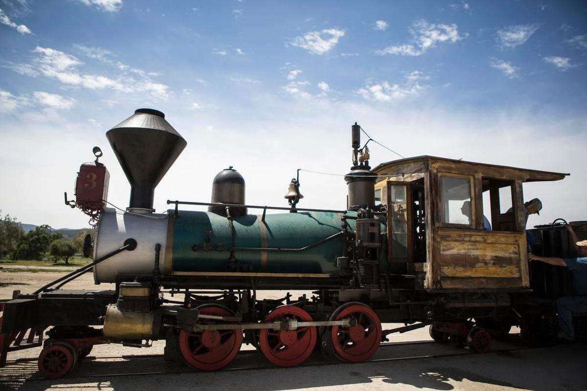 A steam engine built in 1898 pulls the Disney cars at Santa Margarita Ranch.