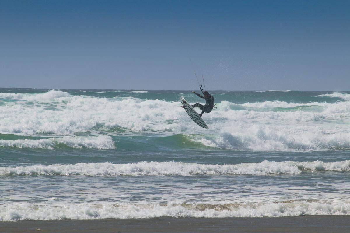 Nick Wapner back in the ocean kite surfing after recovering from injuries from a shark attack on Jan. 8, which took place at Montaña de Oro State Park.