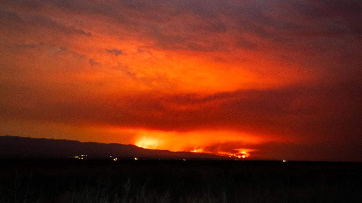 Flames from the Hurricane Fire light up the sky in eastern San Luis Obispo County on Saturday night, July, 23, 2024.