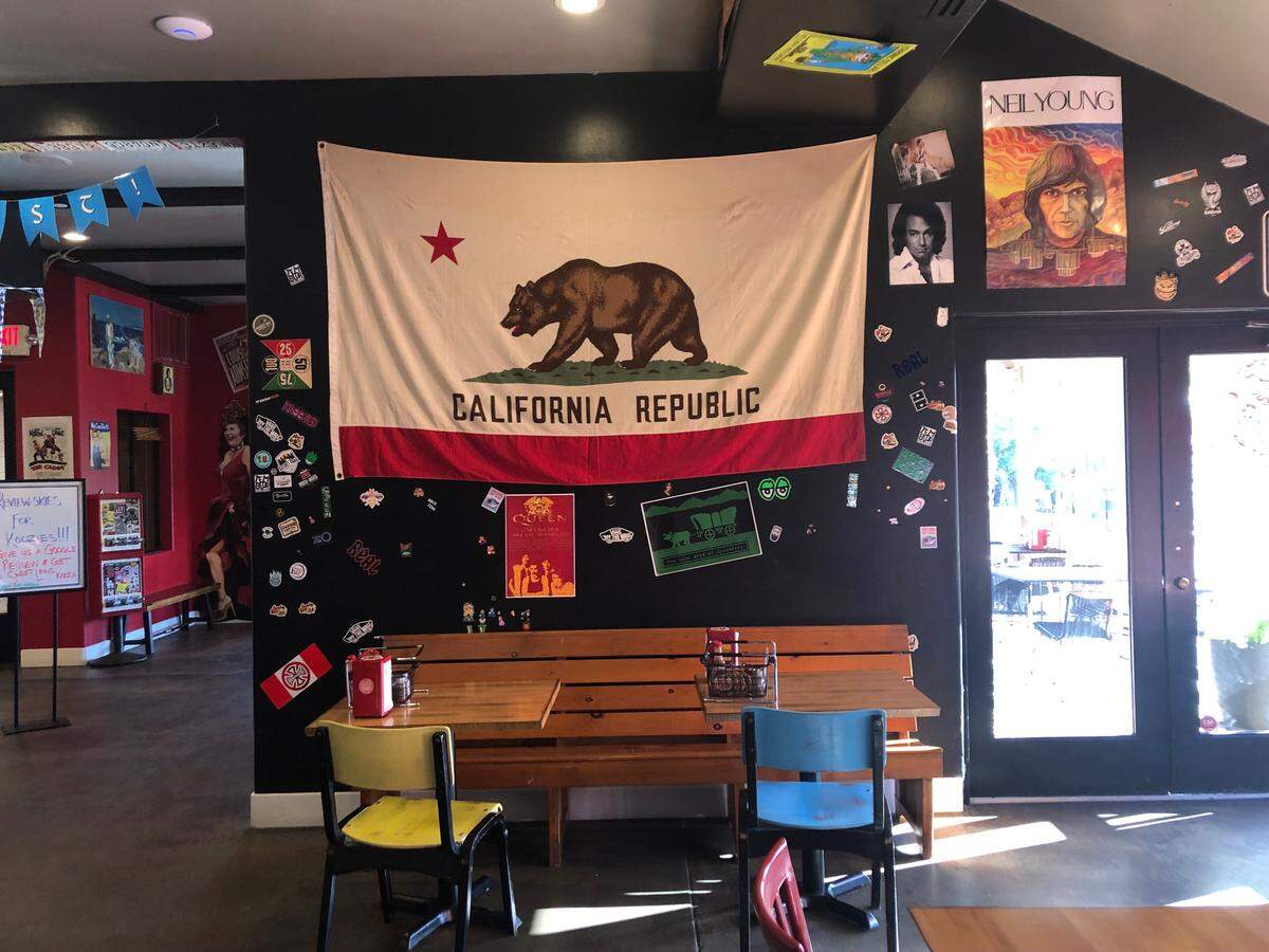 The dining room at Sweet Lew’s pizza restaurant in downtown Paso Robles has a relaxed, 1980s vibe.