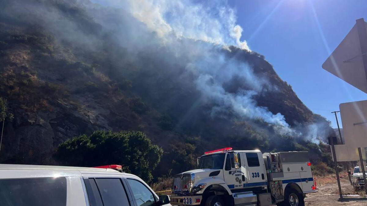 Firefighters were battling a vegetation fire near Highway 101 in the Gaviota area on Oct. 31, 2024. 