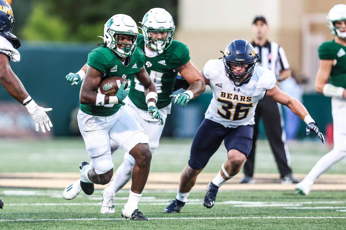 Cal Poly running back Kendric Sanders (34) rushes up the middle during the Mustangs’ 24-17 over Northern Colorado on Saturday, Oct. 21, 2023, at Mustang Memorial Field.