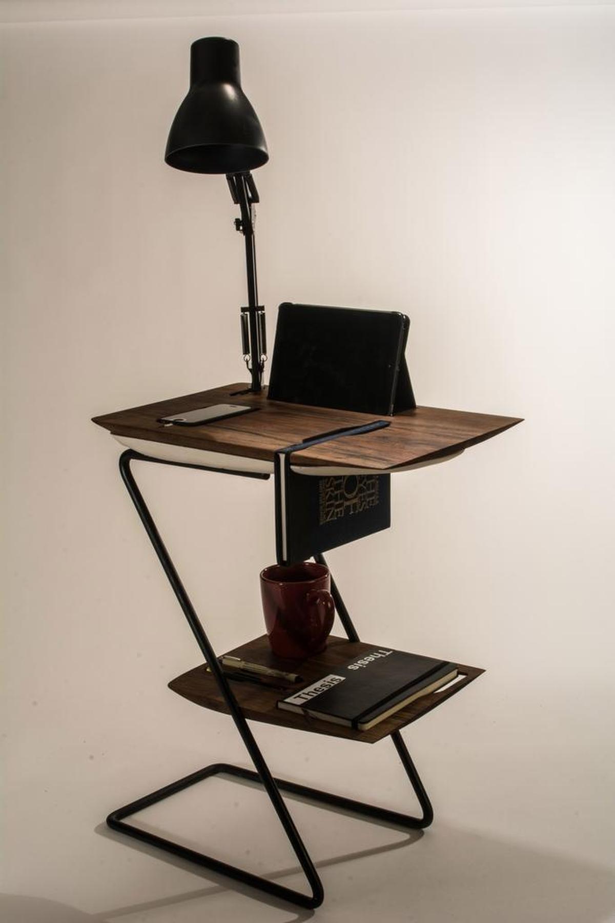 Josh Miller’s winning multi-level side table with incorporated lamp in last weekend’s 14th annual Vellum Furniture Design Exhibition hosted by Cal Poly.