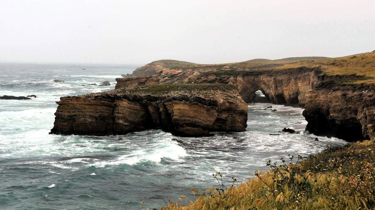 The marine layer drifts over the Pecho Coast. 