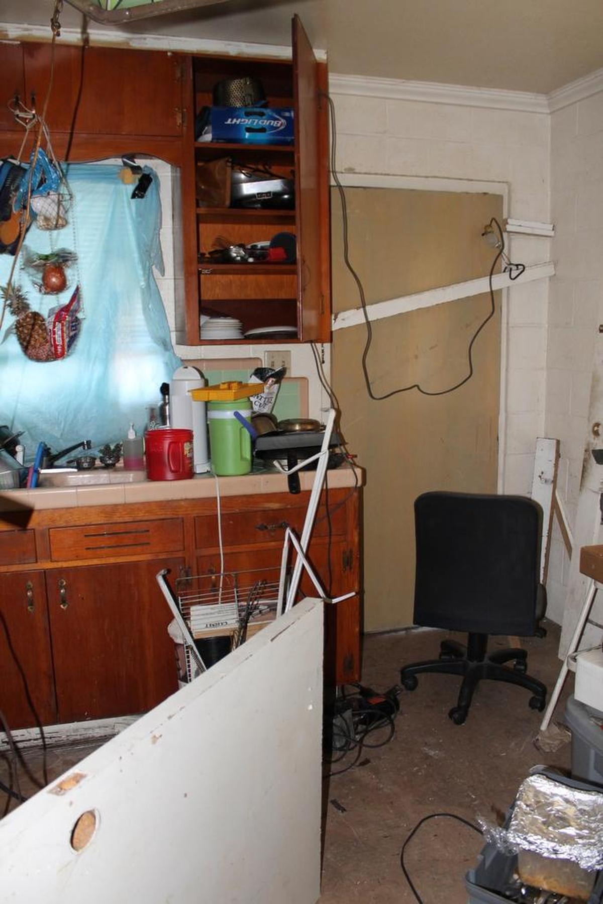 This photo, provided by the city as an example of health and safety concerns, shows excessive and hazardous electrical cords.