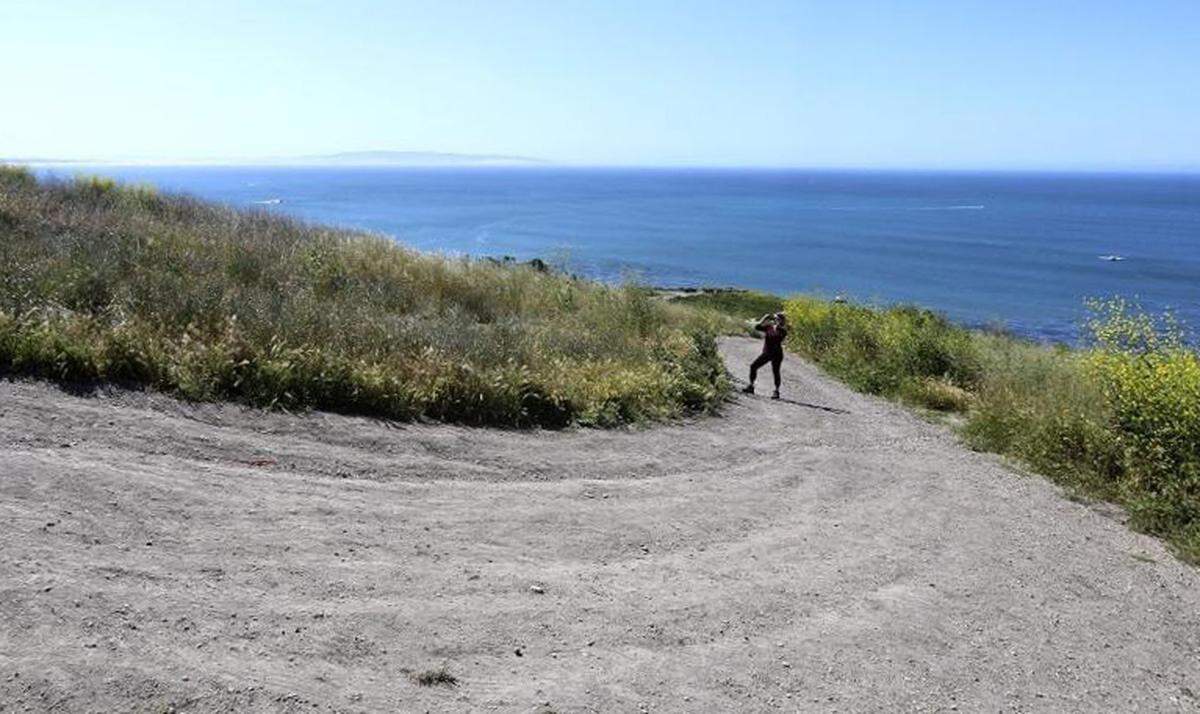 People are enjoying Ontario Ridge Trail on warm, beautiful Sunday, April 23, 2017. Looking toward the south from the mid-way point along the trail.