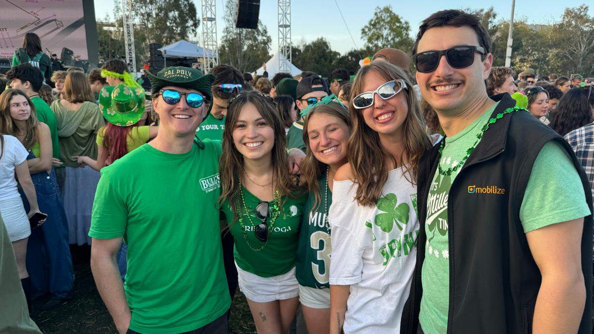 Students pose for a photo during Cal Poly’s “Morning on the Green” music festival — the university’s St. Fratty’s Day alternative — on Saturday, March 15, 2025.